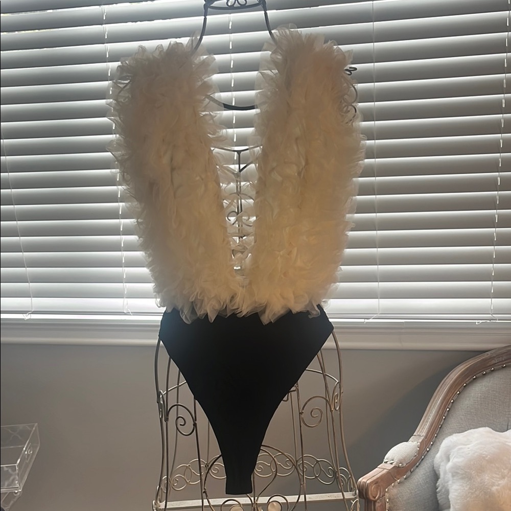 Elegant Cream and Black Bodysuit